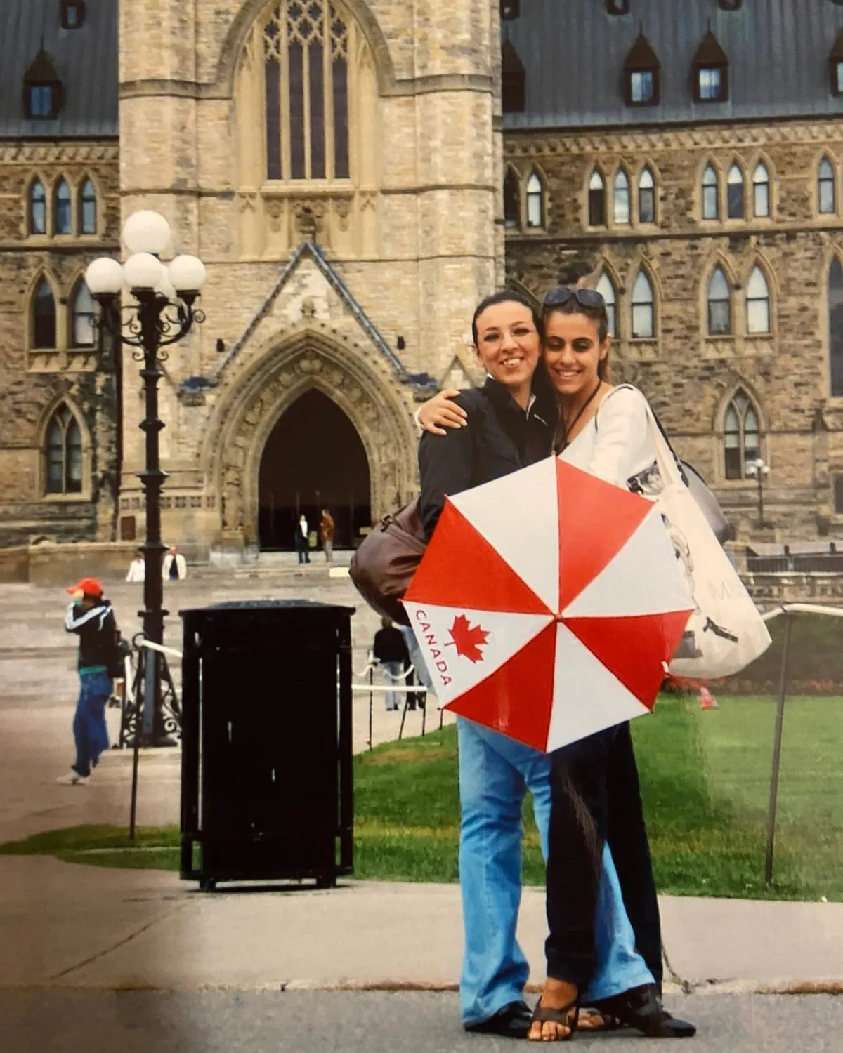 Claudia in front of the Parliament building in Ottawa, Canada