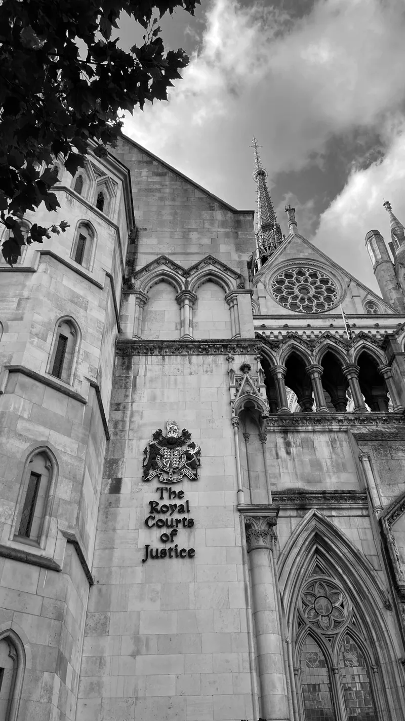 The Royal Courts of Justice in London, with its carved sign